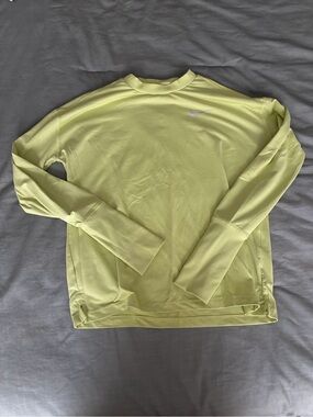 Nike Running Women's Scoop Crew Pullover in Neon Yellow